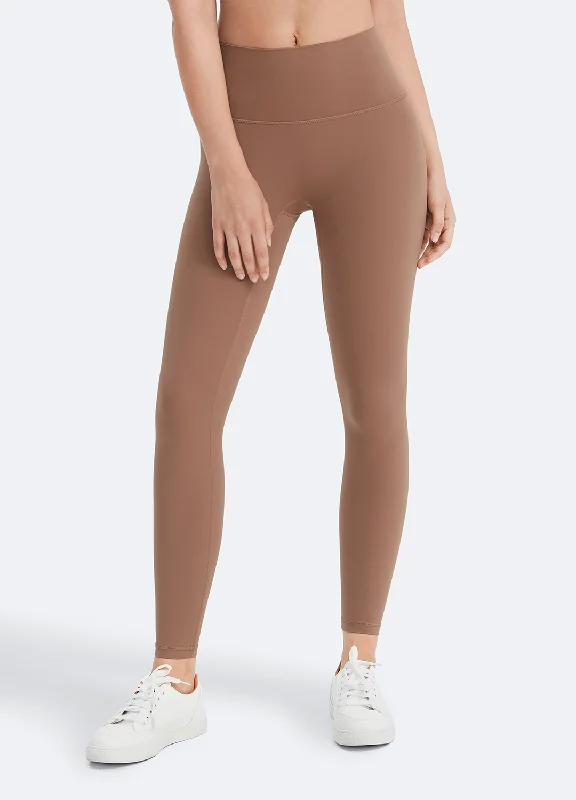 Women's Faux Leather Tight Trousers with Studded Details in Brown for an Edgy StyleCasual Fit Leggings