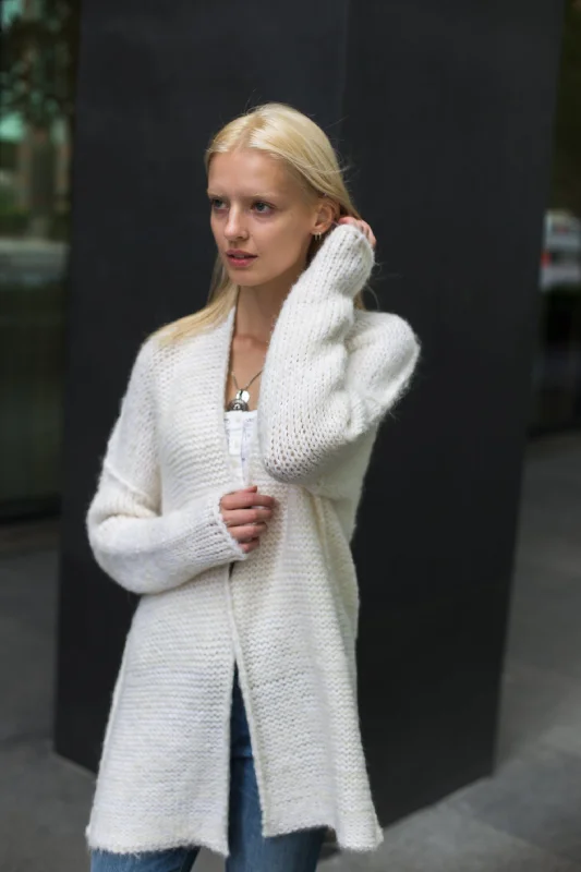 cable knit women cardigan with intricate patternsWhite alpaca knit cardigan.