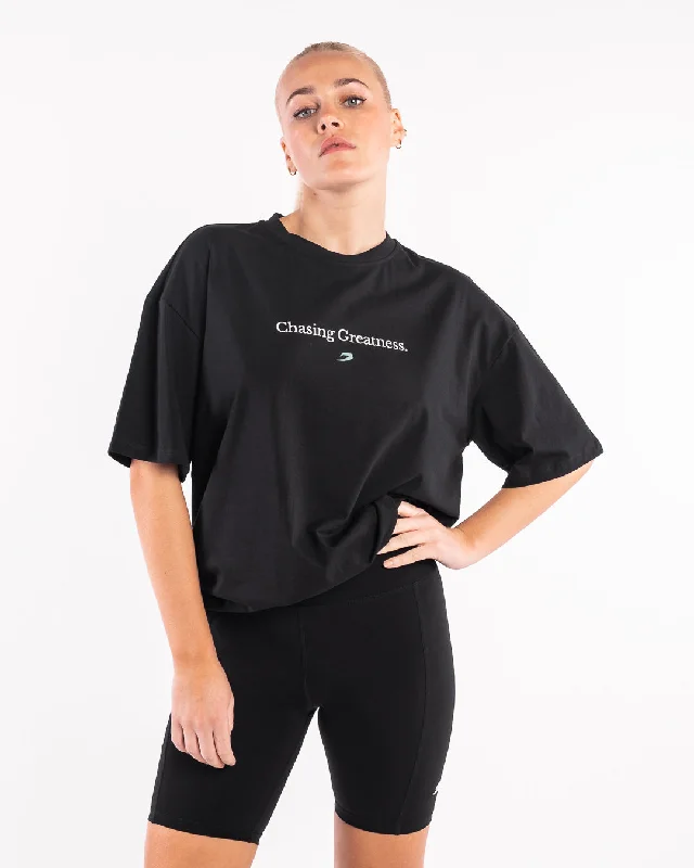 Distressed Women T Shirt with a Laid - Back AestheticChasing Greatness Oversized T-Shirt - Black